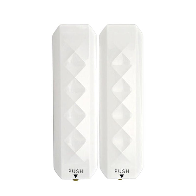 Bílý designový dávkovač mýdla na zeď