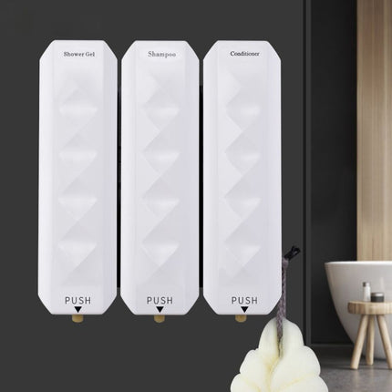 Bílý designový dávkovač mýdla na zeď