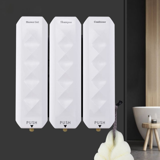 Bílý designový dávkovač mýdla na zeď