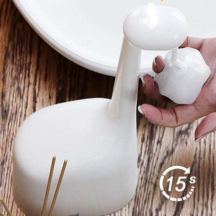 Dávkovač mýdla ve tvaru žirafy