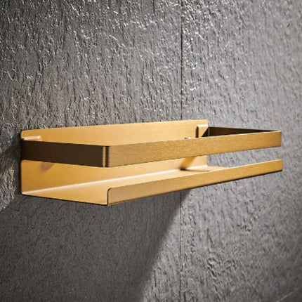 Designová sprchová polička ve zlaté barvě