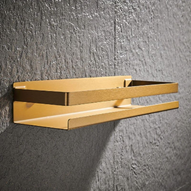 Designová sprchová polička ve zlaté barvě