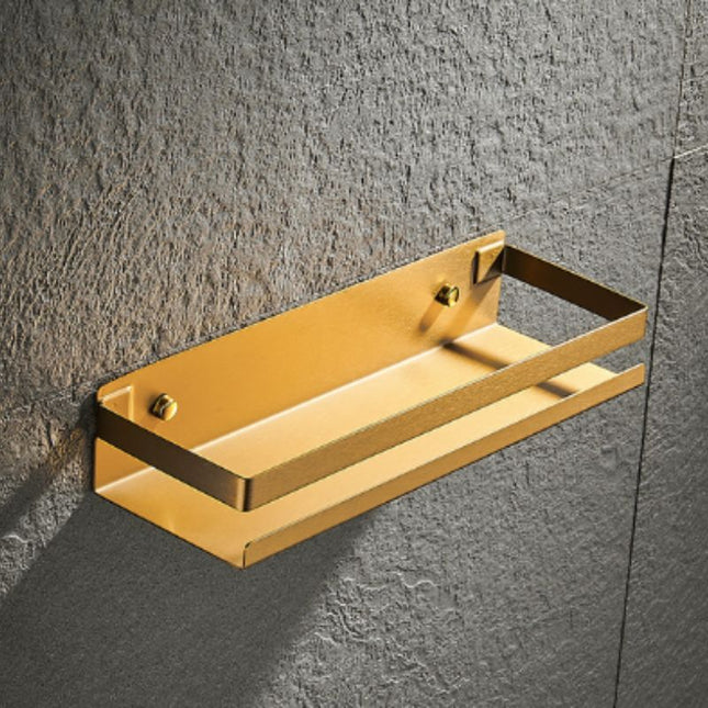 Designová sprchová polička ve zlaté barvě