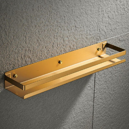 Designová sprchová polička ve zlaté barvě