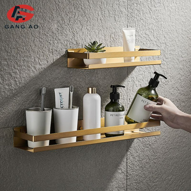 Designová sprchová polička ve zlaté barvě